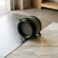 High-Flow Performance Air Intake Filter on marble floor