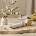 Luxury Shower Head Water Filter on travertine with eucalyptus